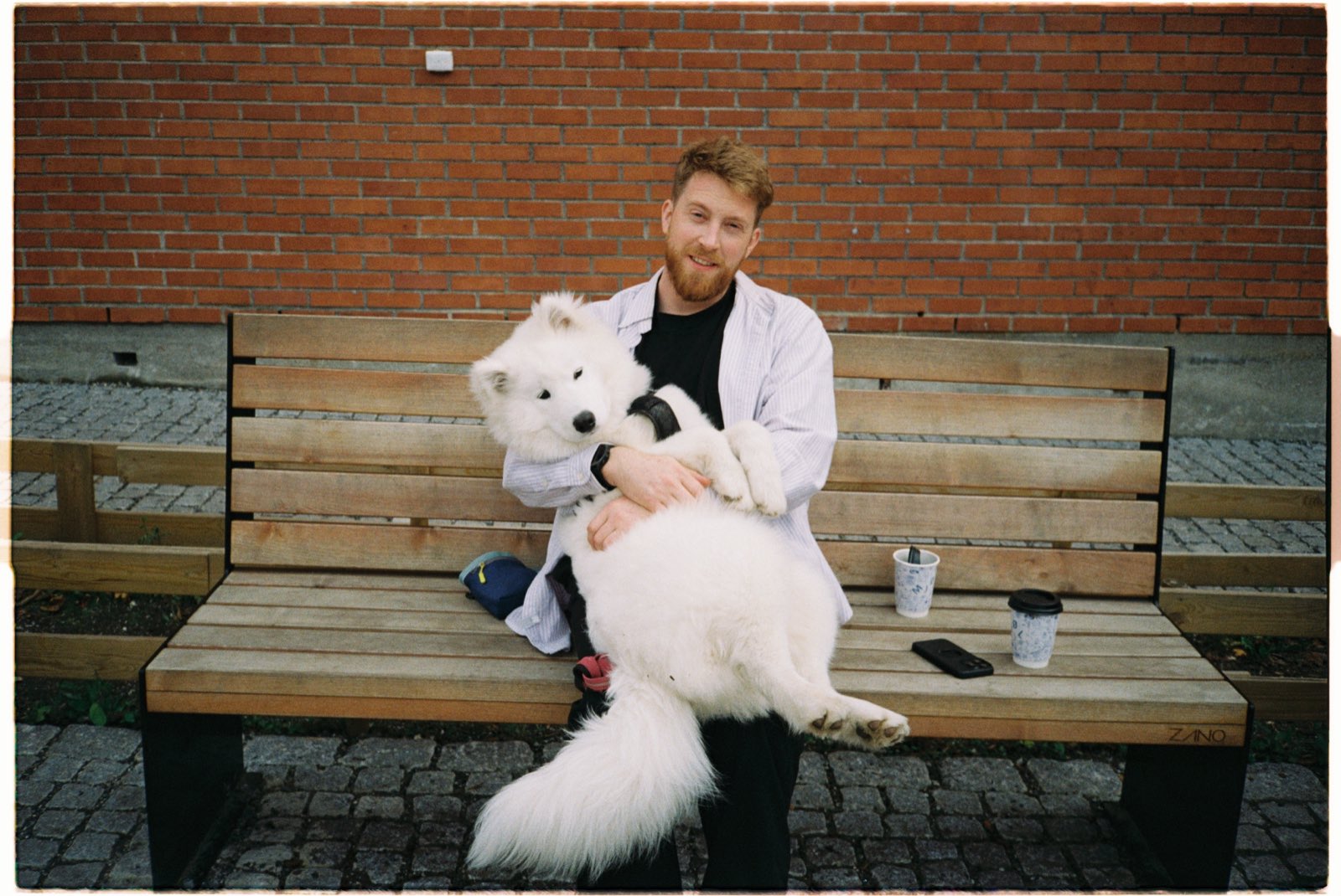 Erlend Brenna Raabe with a Samoyed dog